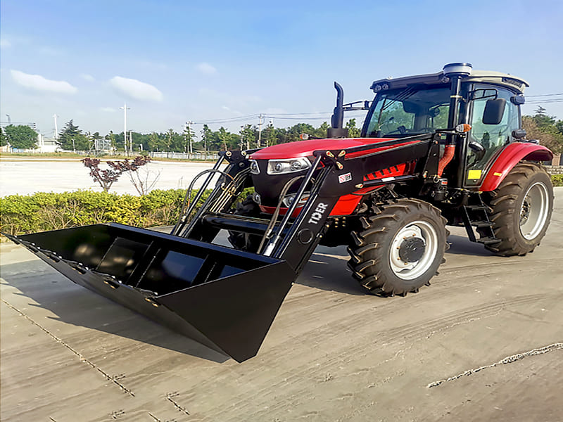 Agricultural tractor with front loader attachment, heavy-duty hydraulic lifting cylinder for farm loading work