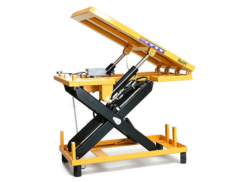 Yellow electric tilting scissor lift table fitted with gravity return single acting hydraulic cylinders