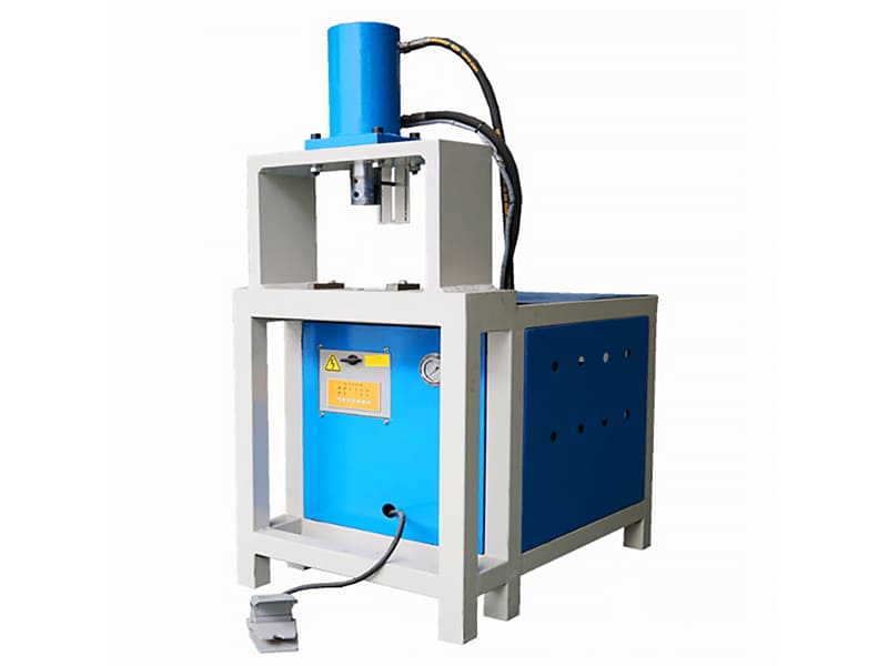 Hydraulic punching machine with gravity return single acting main cylinder