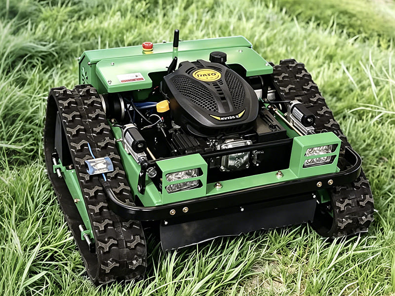 Remote control crawler lawn mower, automatic tracked grass cutting robot on green grass