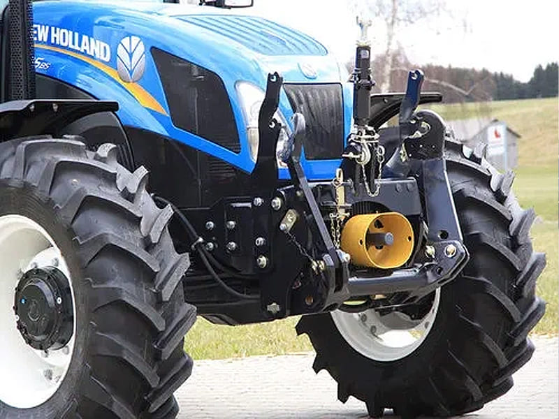 Rear view of farm tractor fitted with three point hitch hydraulic system