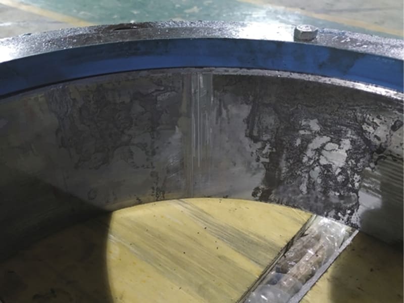 Damaged inner wall of hydraulic cylinder tube with scratch and corrosion marks