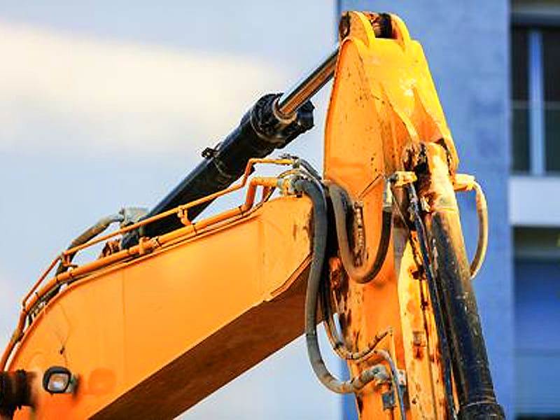 Bucket hydraulic cylinder installed on construction excavator arm