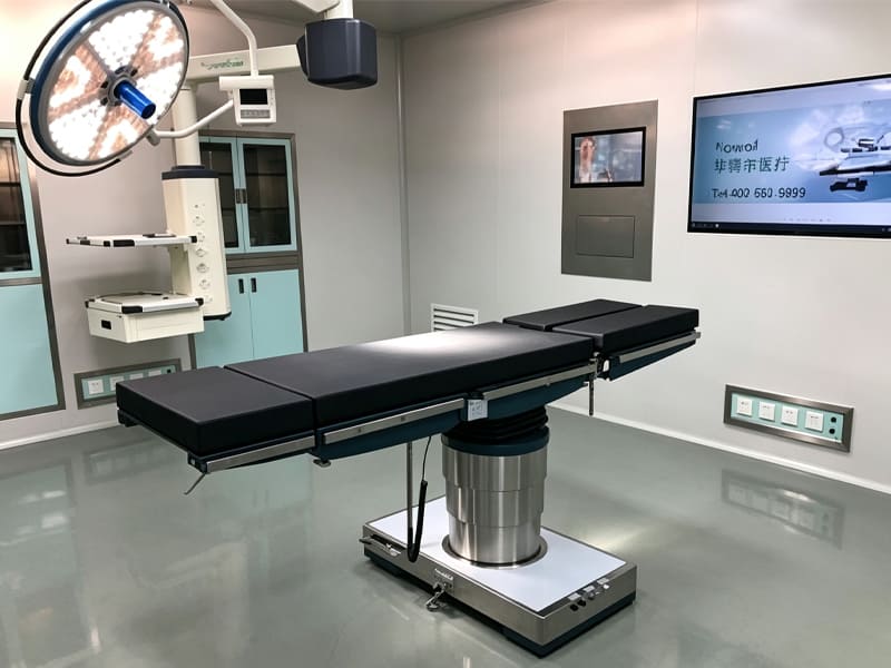 Hospital operating room hydraulic adjustable surgical table device
