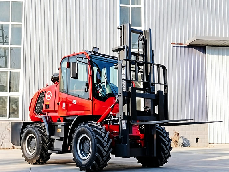 Red 4‑wheel drive rough terrain forklift for outdoor rugged site material handling