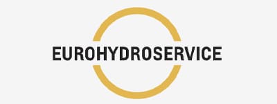 Eurohydroservice official logo, black bold uppercase text framed by golden incomplete circular ring on plain white background, industrial hydraulic service brand graphic