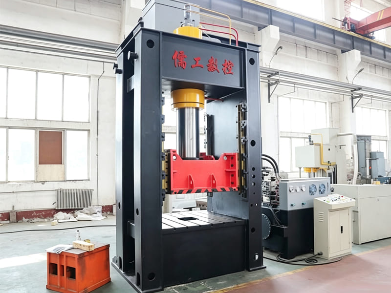 Large gantry hydraulic press equipment in industrial factory workshop