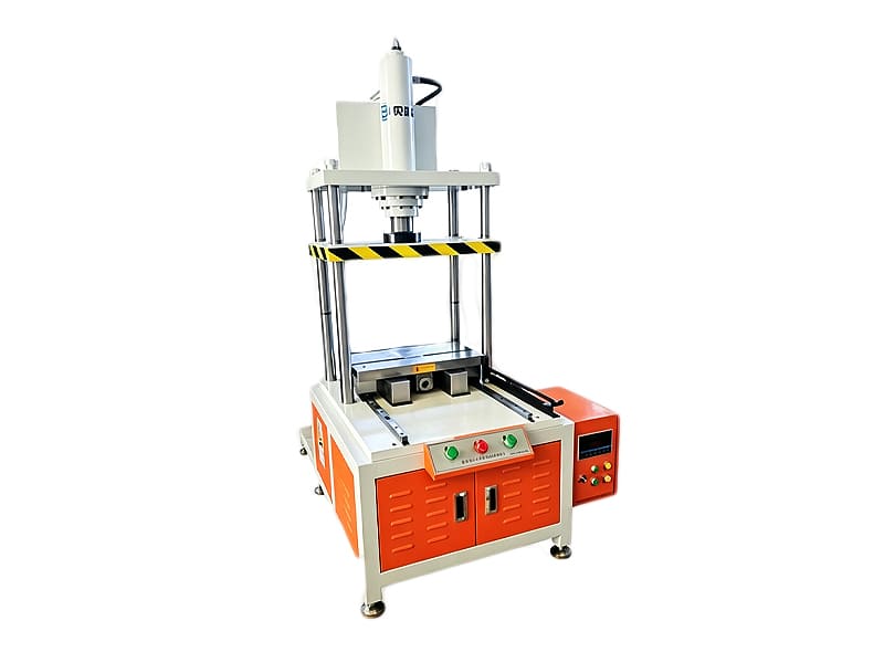 Four‑post hydraulic pressing machine with control panel, safety warning strip and sliding worktable