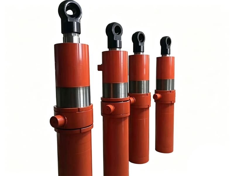 Four orange‑red trunnion mount telescopic hydraulic cylinders arranged on white background