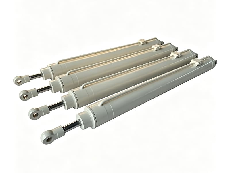 Four off-white hydraulic cylinders with rod end hinge lugs for construction machines