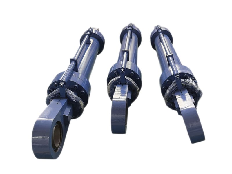 Large blue heavy load hydraulic cylinder with clevis end