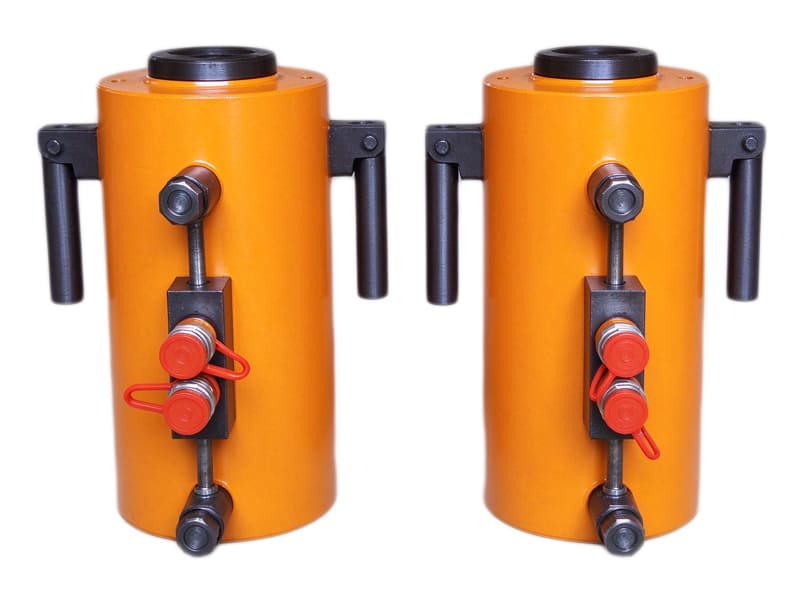 Two orange double-acting hydraulic jack cylinders with quick connectors and handle