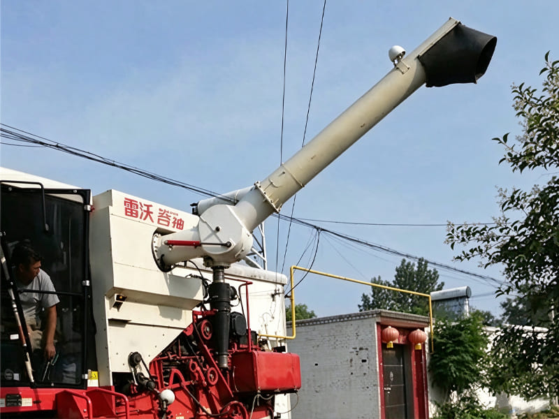 Lovol combine harvester grain unloading tube with hydraulic cylinder, farm harvesting equipment working in rural area