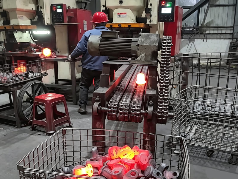 Hot forging production line for hydraulic cylinder components